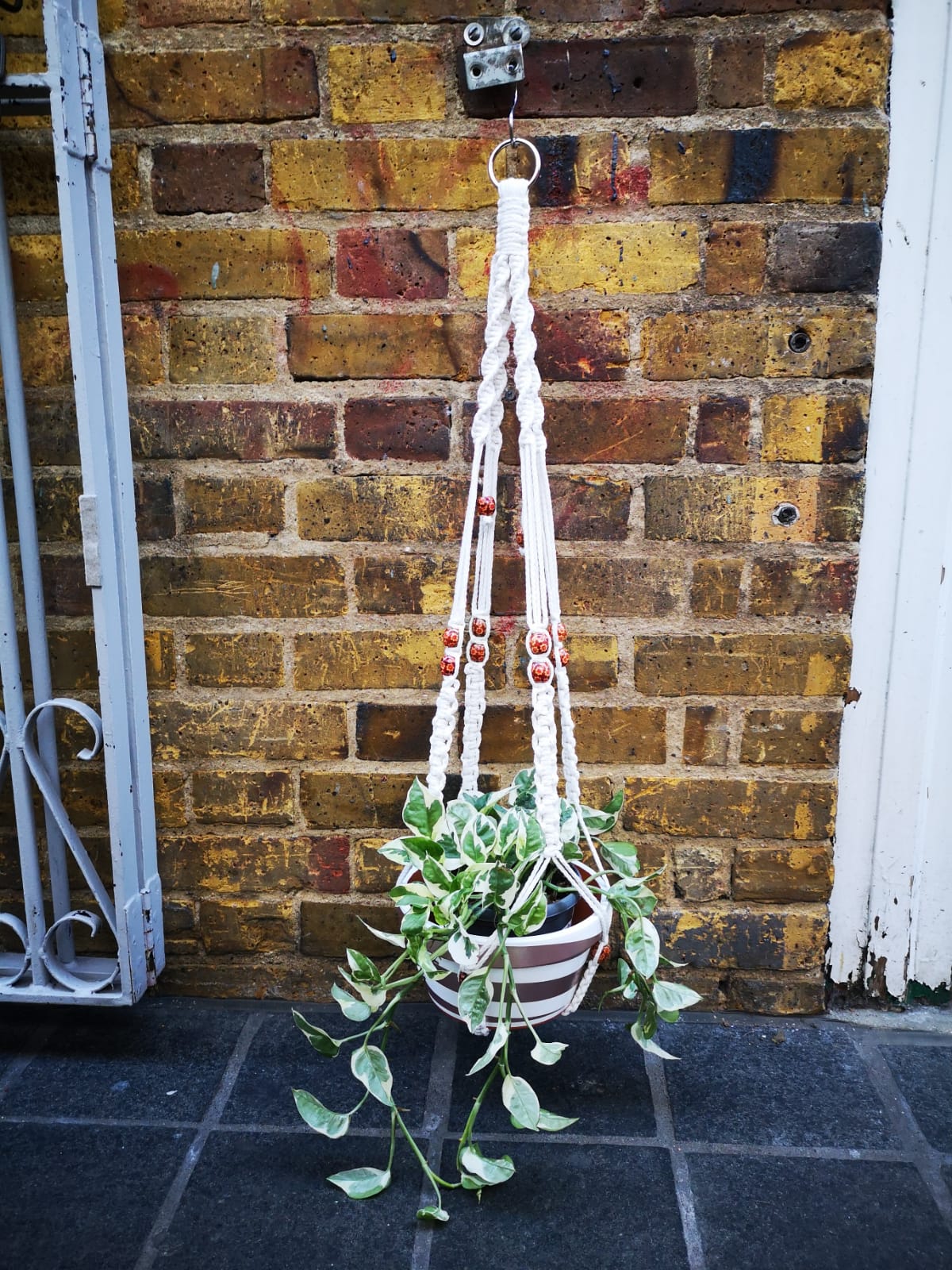 Macrame handmade with white cotton and hand painted wooden beads