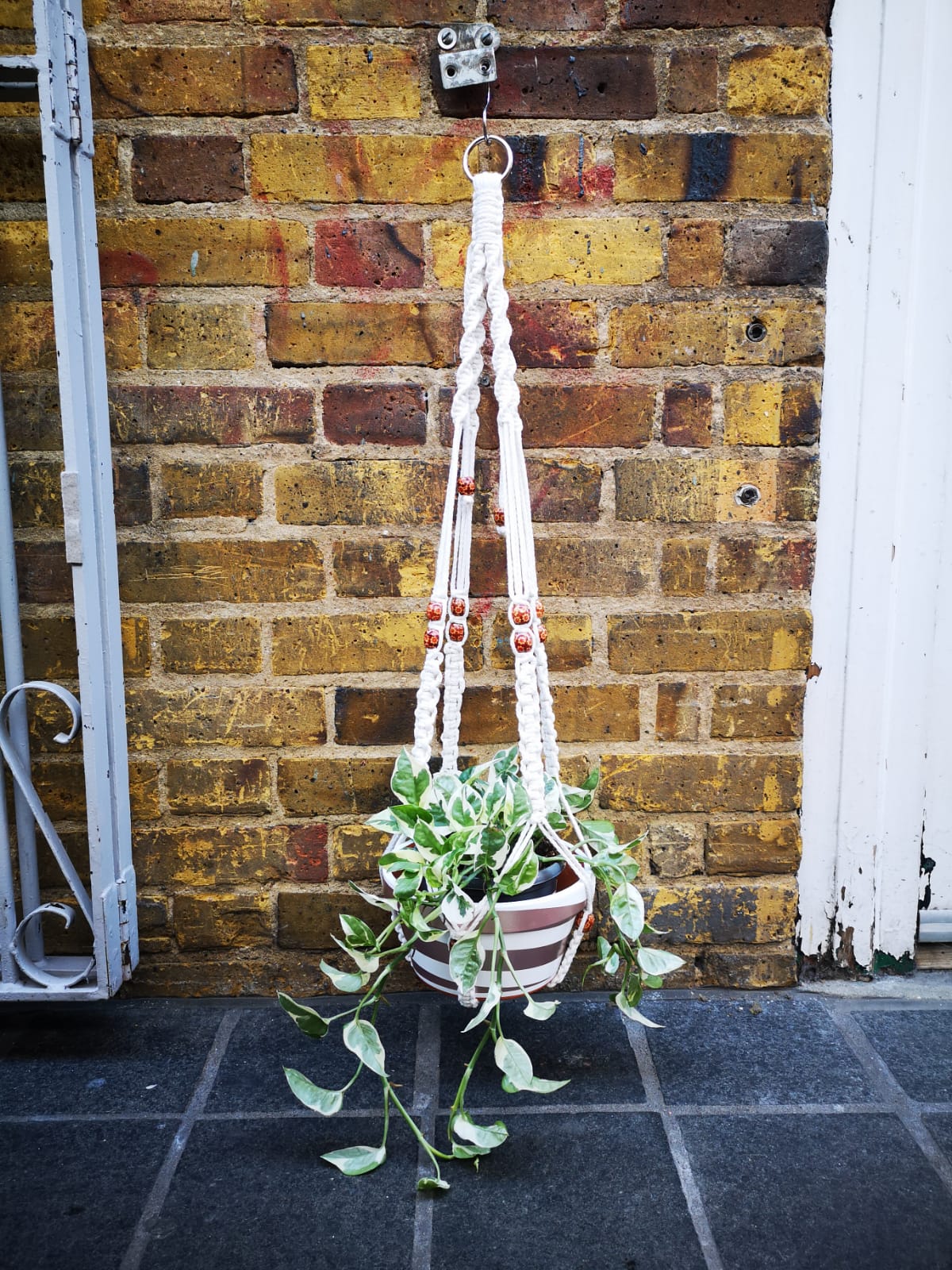 Macrame handmade with white cotton and hand painted wooden beads