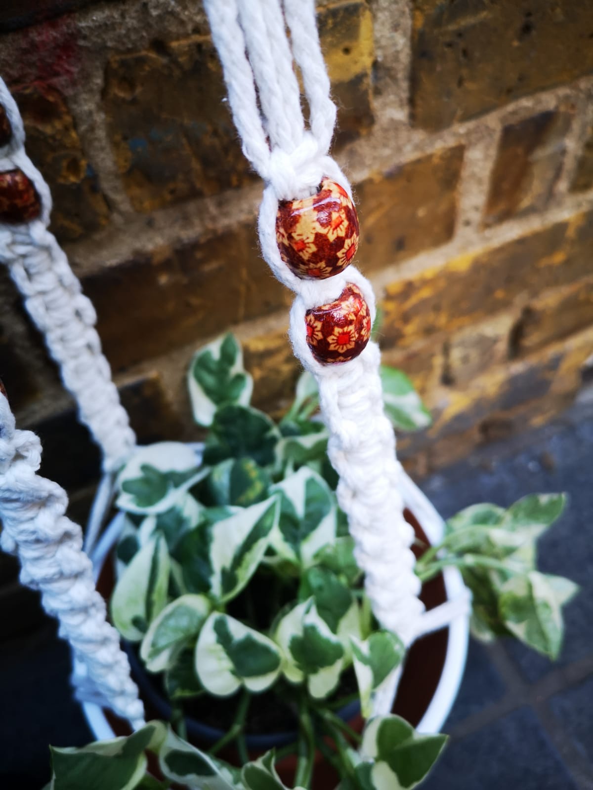 Macrame handmade with white cotton and hand painted wooden beads